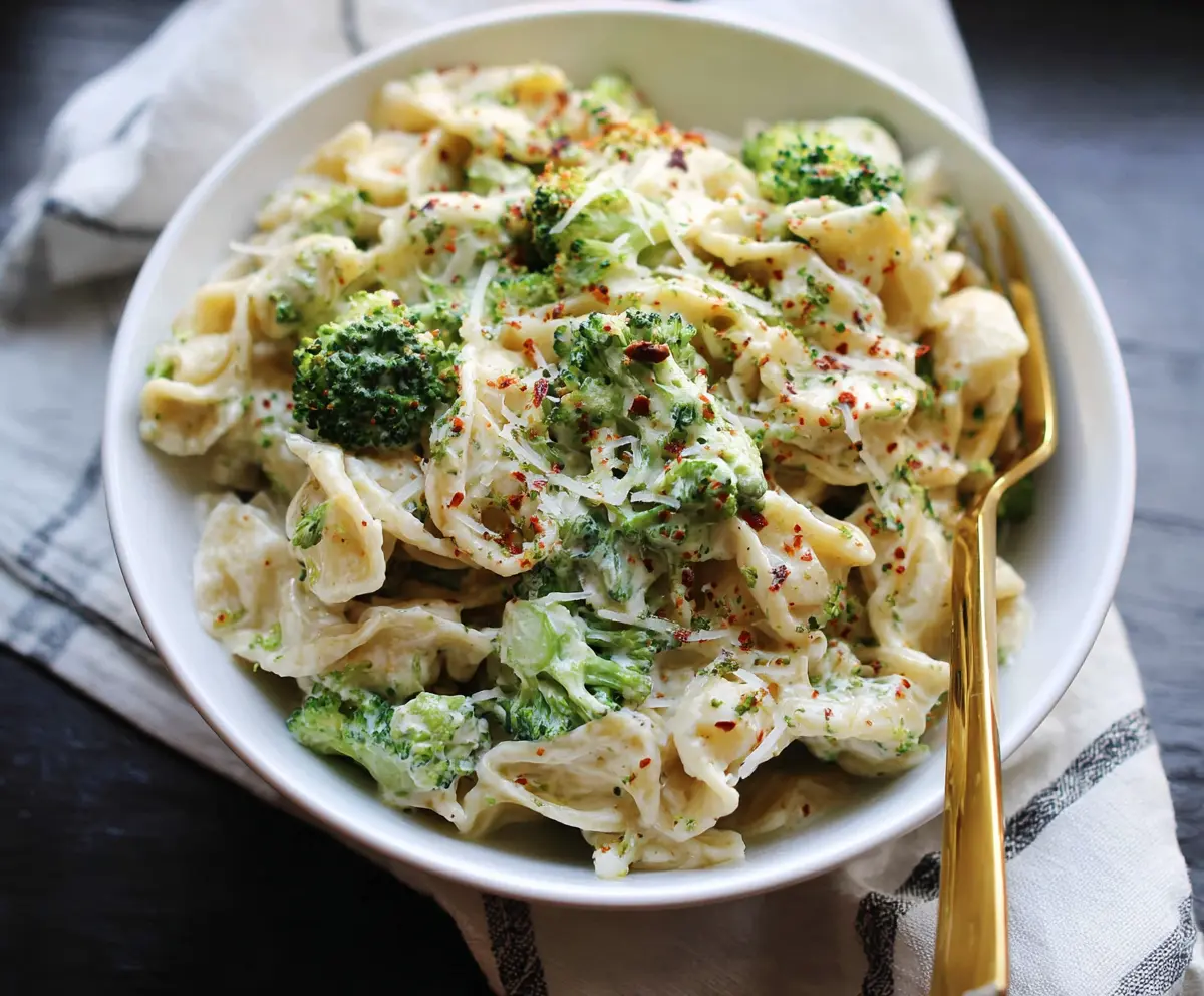 Creamy Boursin cheese pasta with fresh broccoli in a bowl, homemade and SEO-friendly recipe image.