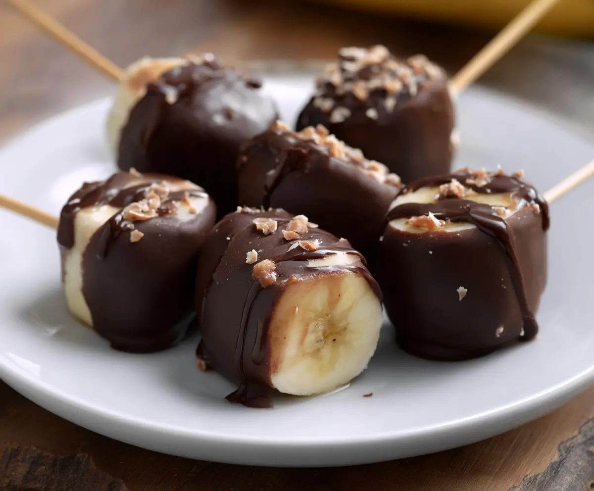 Delicious chocolate covered banana bites, a healthy and sweet dessert snack.