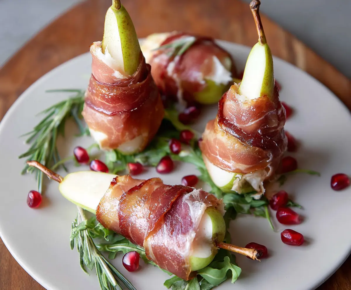 Delicious prosciutto-wrapped pears served as an elegant appetizer.