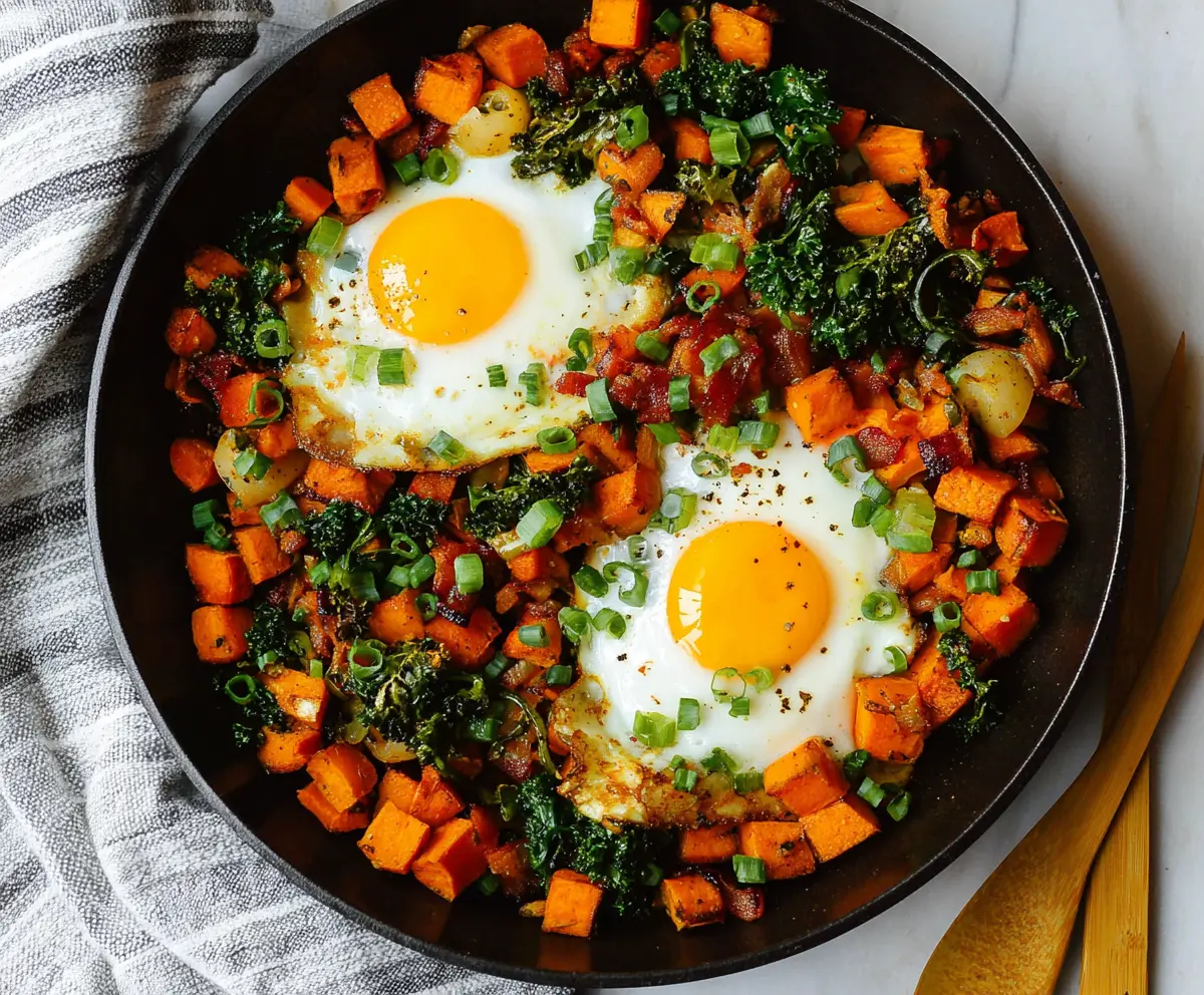 Colorful sweet potato breakfast hash with eggs and vegetables for a healthy start to the day
