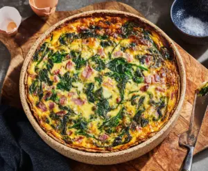 Delicious Easter ham and spinach quiche with a golden crust, perfect for holiday brunch.