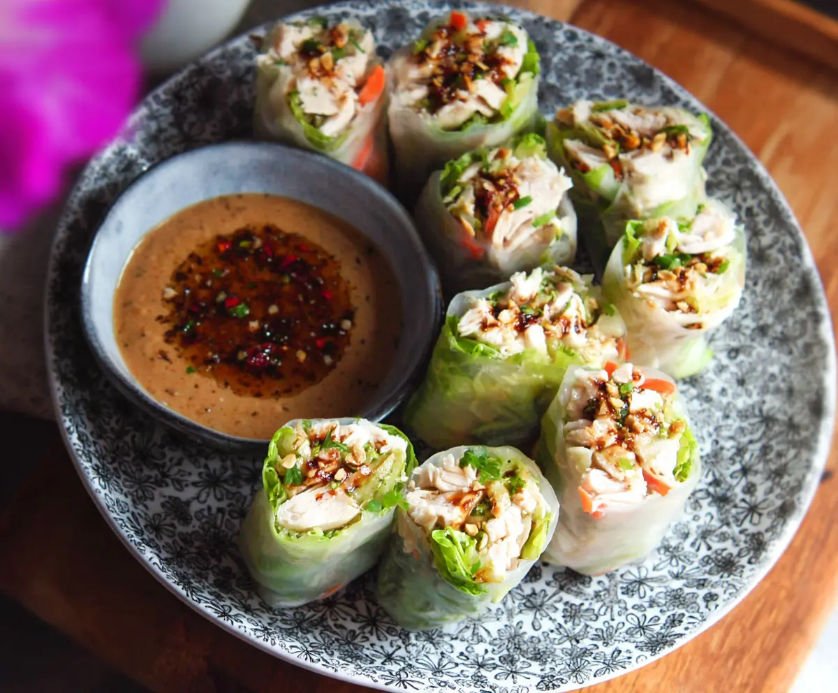 Delicious Caesar Chicken Rice Paper Rolls with fresh crisp vegetables and creamy dressing
